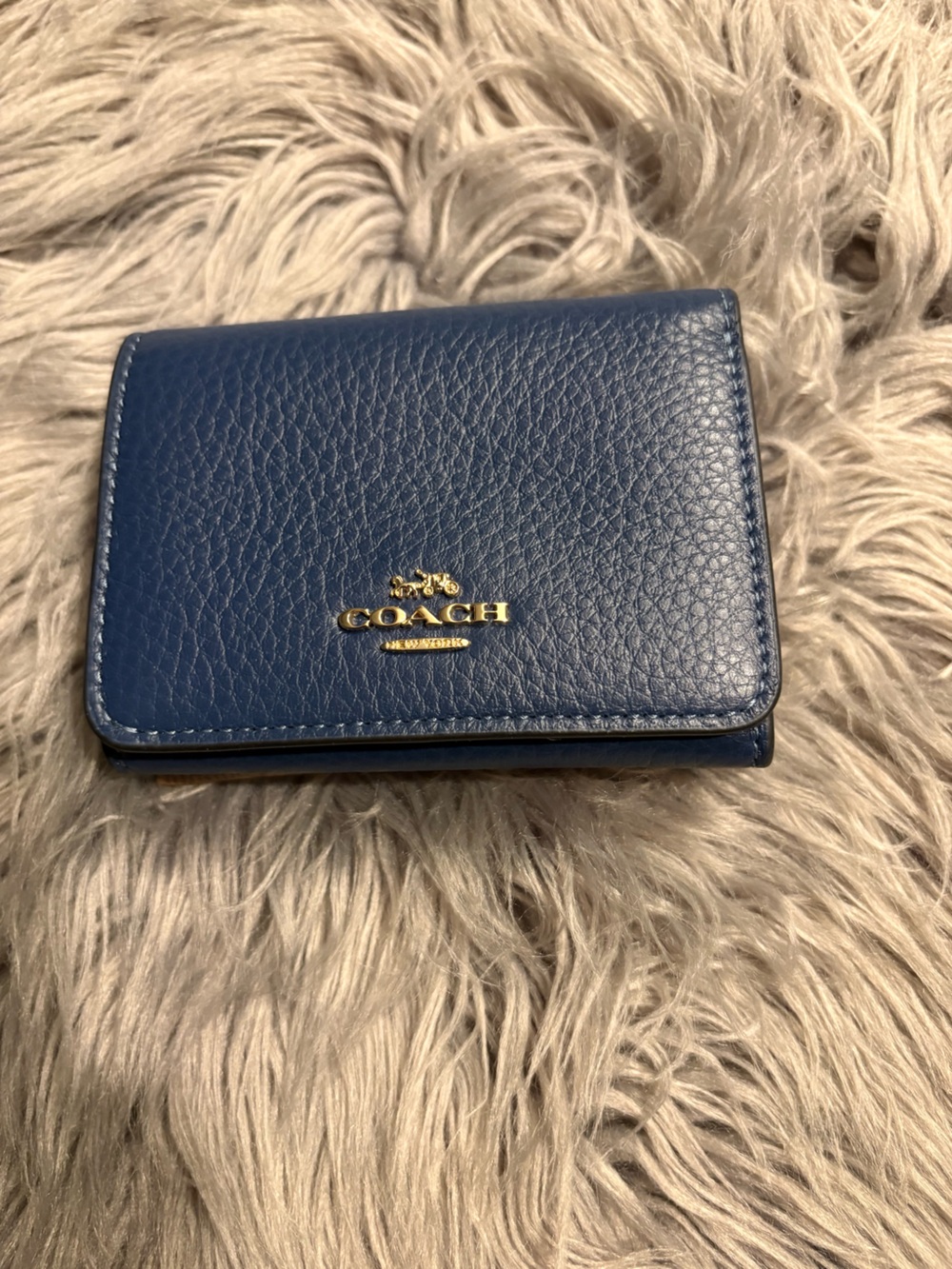 COACH Navy Pebbled Leather Trifold Wallet with Gold Logo